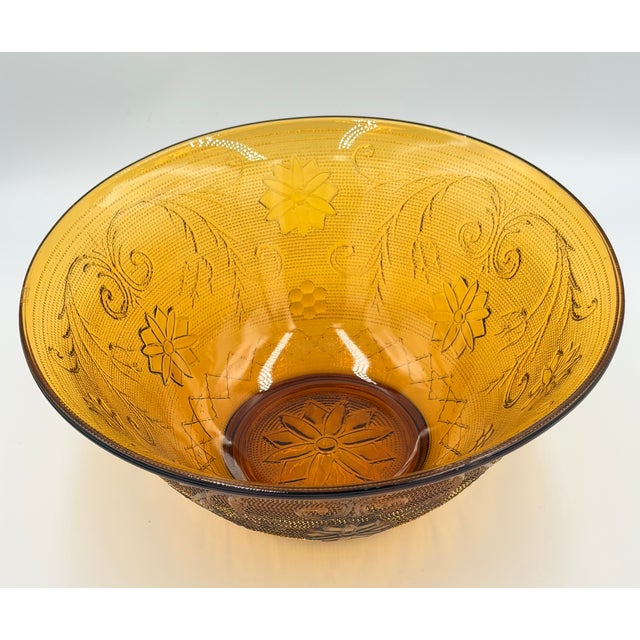 Timeless elegance of this stunning vintage Indiana Glass Tiara Amber bowl! This exquisite piece showcases the classic...