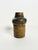A French stoneware pot from the 1960s, exemplifying the post-war revival of handcrafted ceramics. Its architectural and...