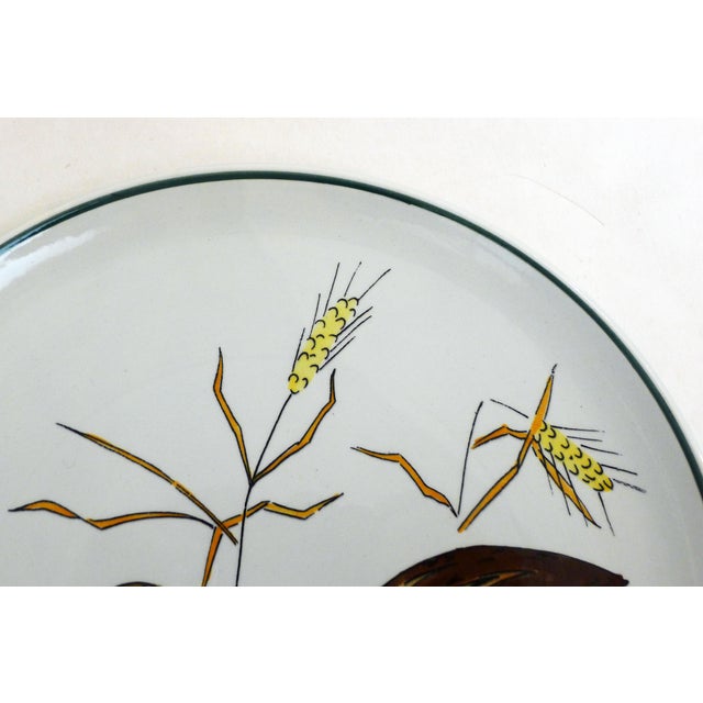 Flat plate from the “Birds” series, with very beautiful hand-painted decoration of two small quails / partridges & ears of...