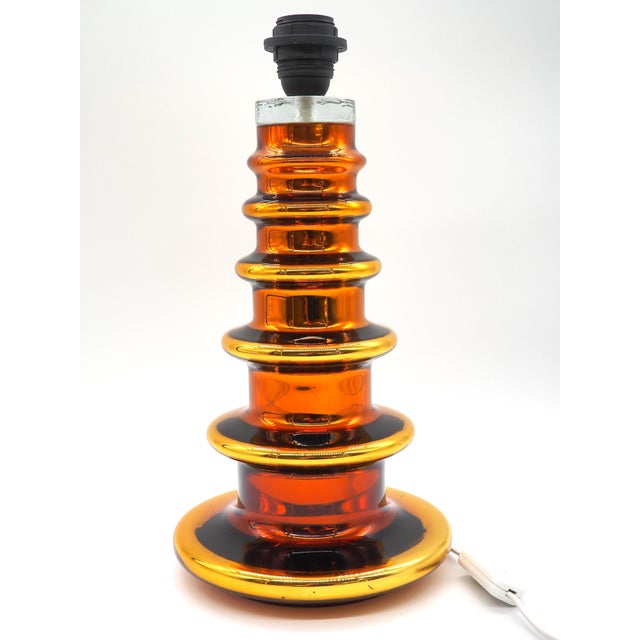 A rare and beauteful copper-colored glasslamp by Gustaf Leek for Orrefors in Sweden. Gustaf Leek was a Swedish designer...