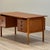 Erik Brouer designed this Mid-Century Danish desk, which was handcrafted in rich and warm teak wood by Brouer Møbelfabrik...