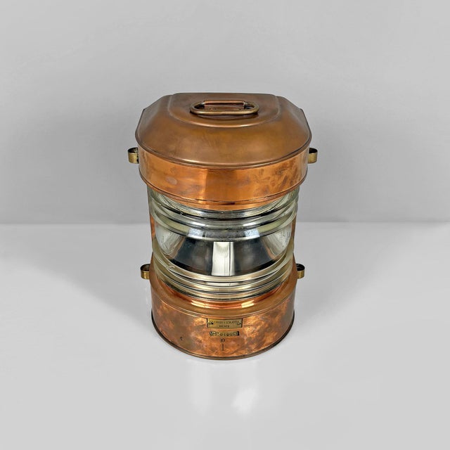 German mid-century Naval navigation lantern in copper with Fresnel lens, 1950s Naval navigation lantern with a cylindrical...