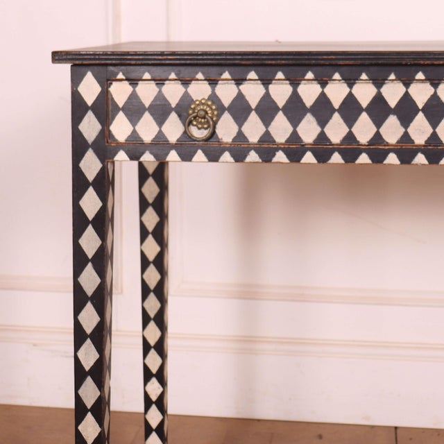 Late 19th C English painted one drawer harlequin decorated pine lamp table. 1890. Dimensions:W: 91.5cm (36")H: 79cm...