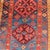 Brick Red Antique Kurdish Gallery Rug With Indigo Field and Bold Tribal Medallions For Sale - Image 8 of 12