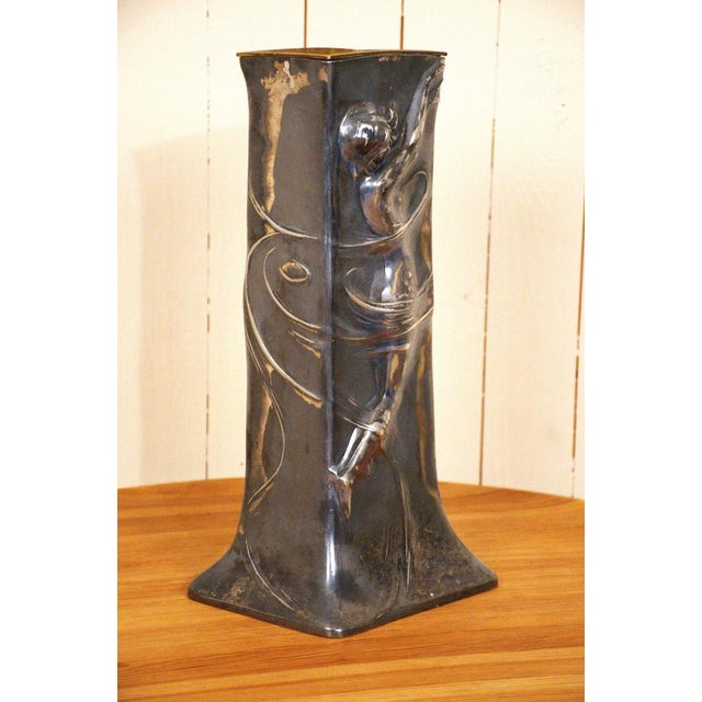 Very large art nouveau or jugendstil silver plate vase by wmf. This vase has two different decors, with a naked woman on...