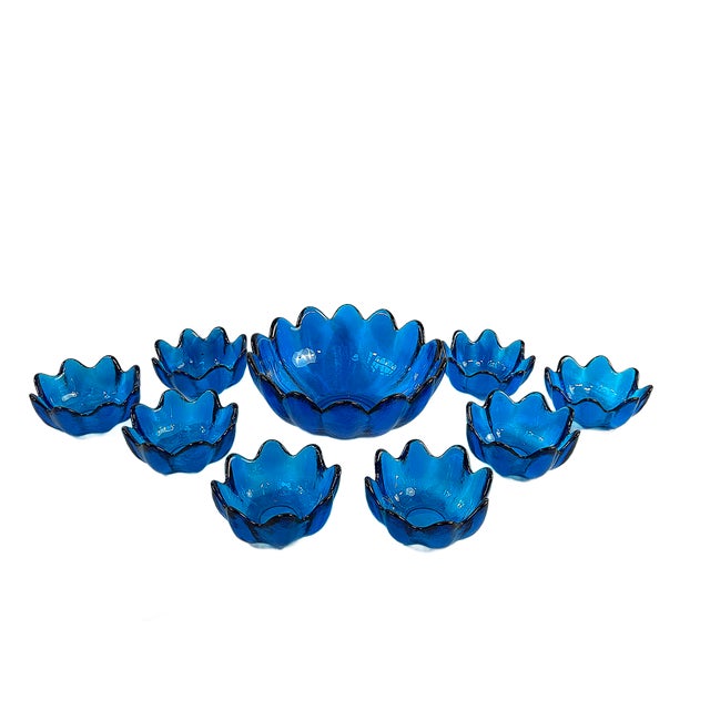 This is a fantastic vibrant Blenko hand-blown art glass bowl set executed in a richly saturated blue. Each piece features...