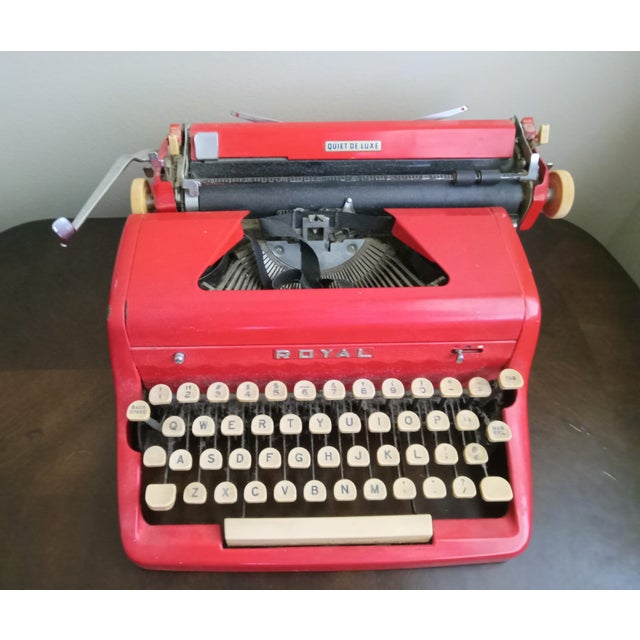 Vontage Royal typewriter labeled "RA-925" is a Royal Quiet De Luxe portable manual typewriter manufactured in July 1956....