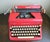 Vontage Royal typewriter labeled "RA-925" is a Royal Quiet De Luxe portable manual typewriter manufactured in July 1956....