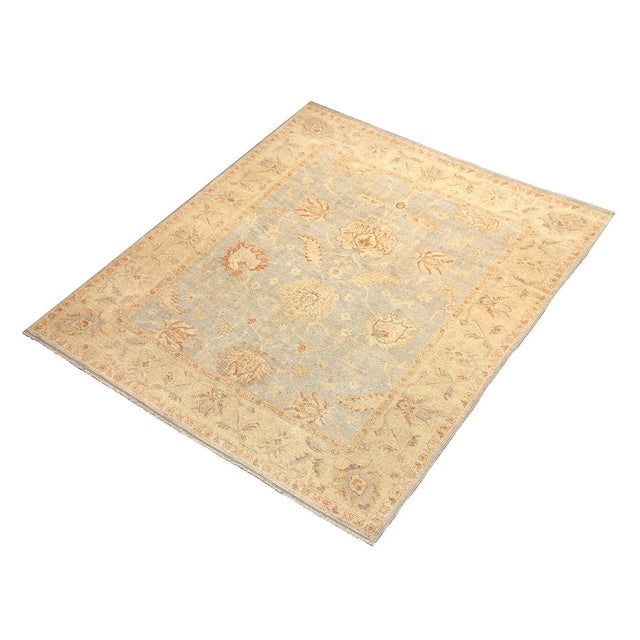 Elevate your interior design project with this magnificent 8'1" x 9'7" Afghan Oushak rug, expertly hand-knotted by skilled...