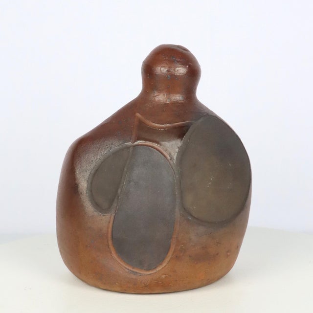 "m.a.j." ceramic vase for georges martin, 1960. Abstract decoration with flat blue areas of color on a brown glazed...