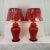 A striking pair of 1960s vintage porcelain ginger jar lamps, finished in a vibrant coral glaze that brings bold color and...