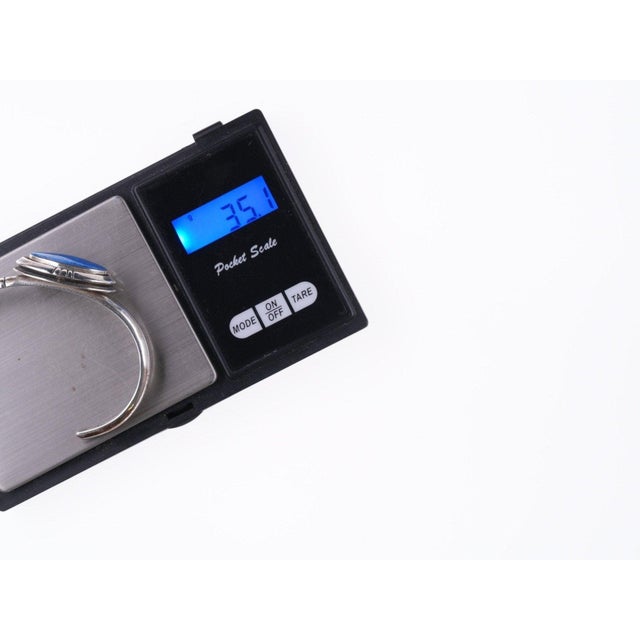 6.5" Leroy Begay Navajo Sterling and denim lapis bracelet. No issues. Award-winning silversmith, Leroy Begay was raised in...