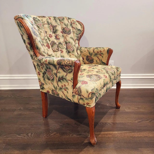 English Curved Wing Back Chair Dimensions: 37h x 31d x 27"w Made if woven jacquard upholstered fabric in a natural floral...