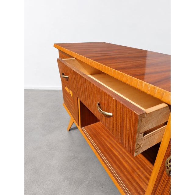 Original mid-century sideboard, vintage from the 1950s, a perfect example of post-war Italian craftsmanship. The piece...