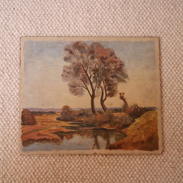 This 20th century French far away farmhouse painting captures the quiet beauty of the countryside with a soft, pastoral...