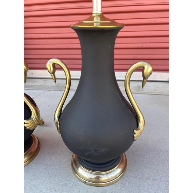Vintage Pair of Frederick Cooper Style Brass Swan Table Lamps. Matte black urn with brass hardware. What a unique pair of...