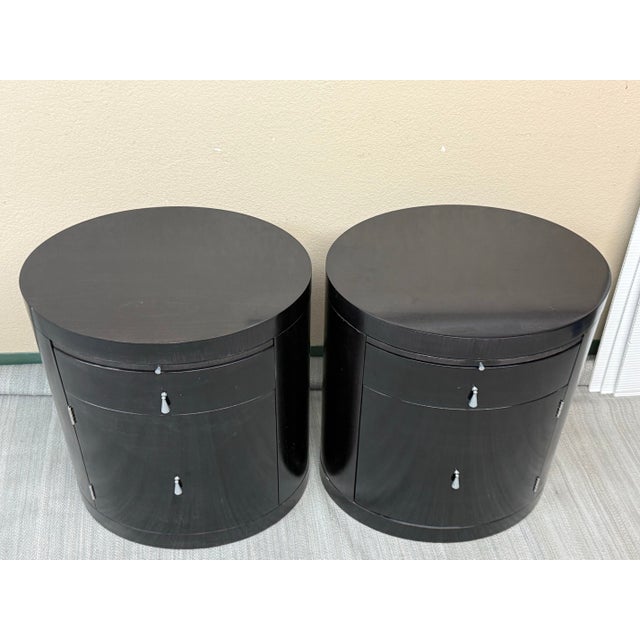 Design Plus Gallery presents a Pair of Archetype Nightstands by Baker Furniture. The tables have contemporary, Art Deco-...