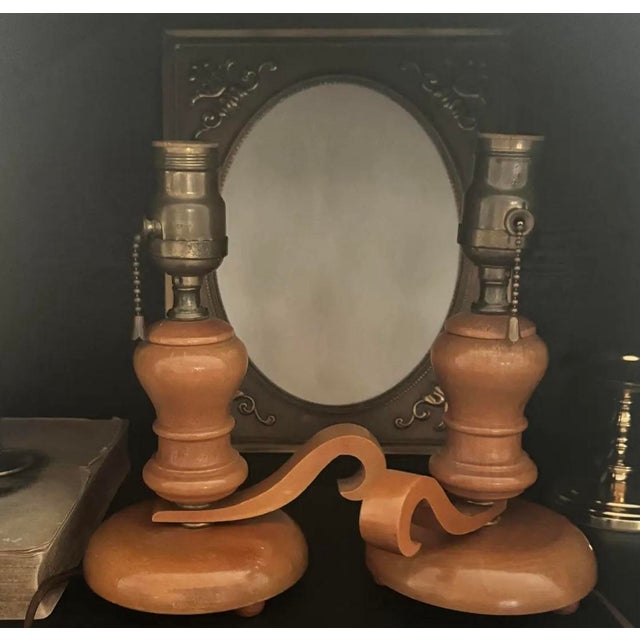 1950s maple lamps with original brass pull chains with a curved bridge detail. Warm honey finish. Each lamp includes a...