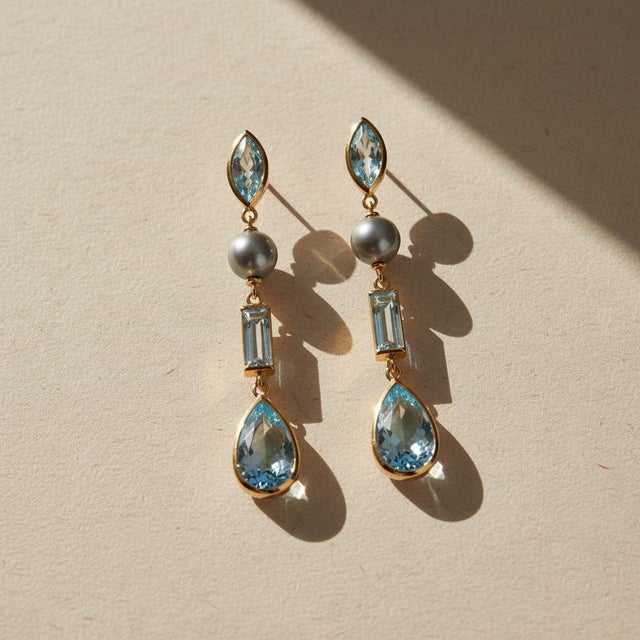 Modern Multi-Shape Sky Blue Topaz Earrings studs. Contemporary Pearl & Sky Blue Topaz Drop Earrings. Geometric Sky Blue...