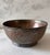 Vintage hand carved copper bowl made in Iran and marked on the bottom. Beautiful detail and rich patina.