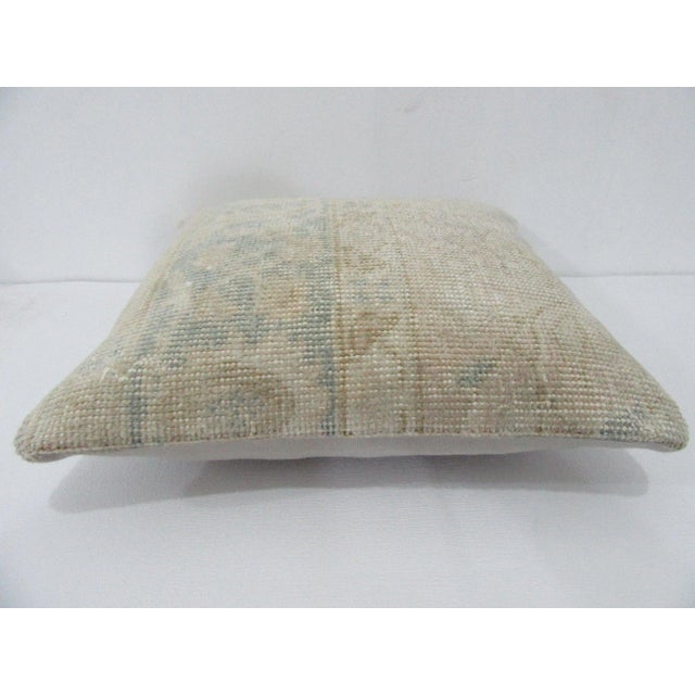 Decorative pillow cover made from a vintage Turkish handknotted rug. Backed with good quality cotton fabric. Pillow...