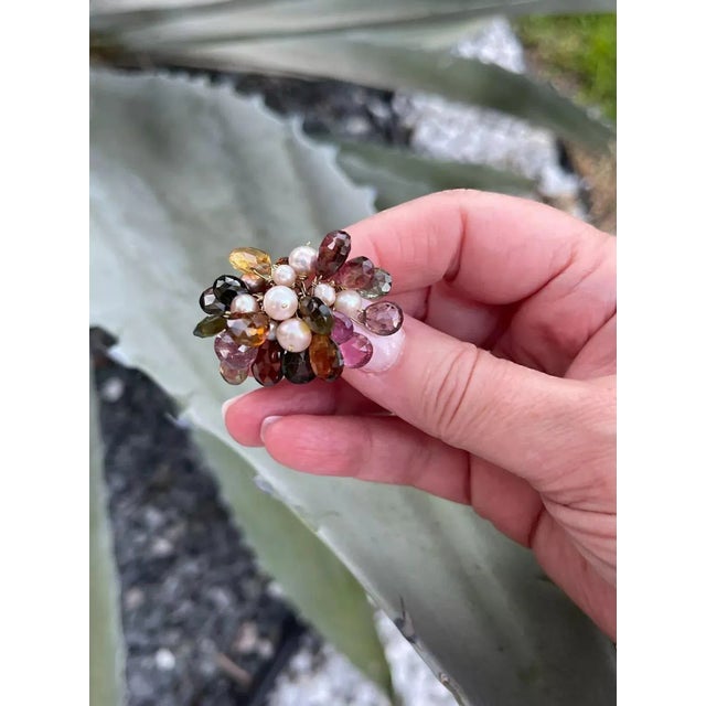 Gorgeous multicolor gemstone & pearl gold ring. Crafted in 18k yellow gold and a large collection of briolette cut...