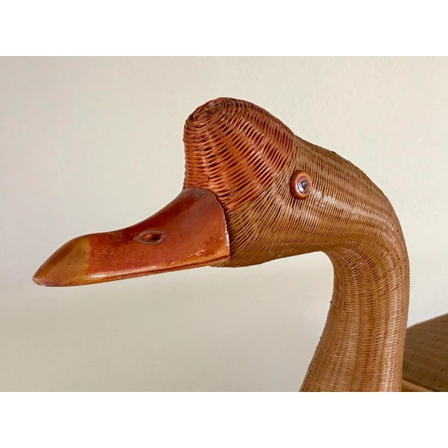 A wicker compartment basket in the form of a goose. From the Shanghai Collection of the 70s. Retains original label....