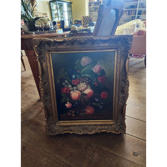 Beautiful hand painted still life painting in a gold frame. This is not old but it's highly decorative. And the gold frame...