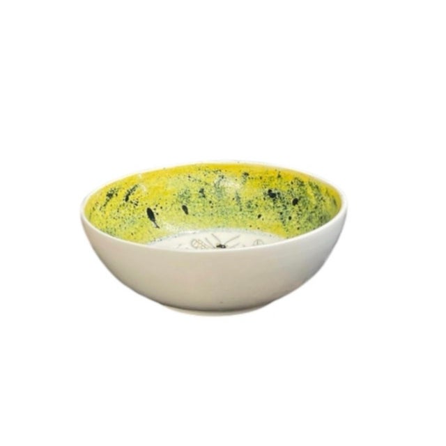 This charming vintage ceramic bowl features an intricate hand-painted design centered around detailed bee illustrations....