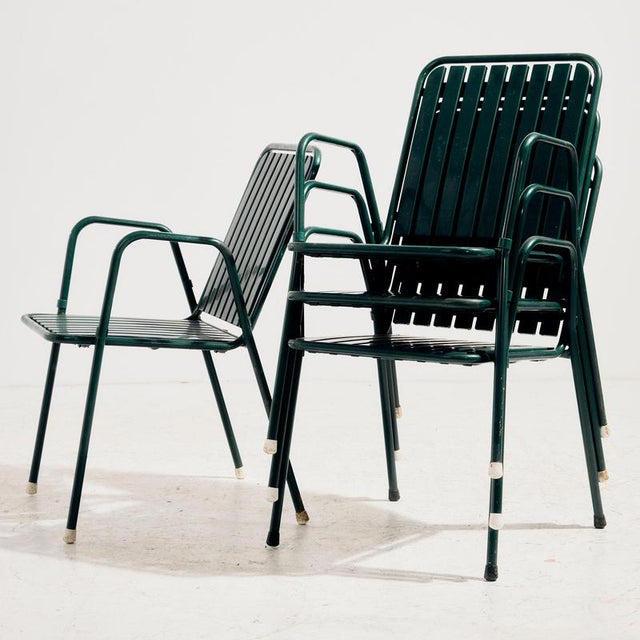 Austrian stackable garden armchair by Karasek on tubular metal frame with plastic seat and backrest from the 1980s. with...