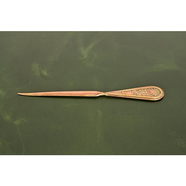 A gorgeous Arts & Crafts or Art Deco period gilt bronze and slag glass "Pine Needle" pattern letter opener By Tiffany...