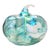 A stunning sculptural art glass pumpkin featuring an unusual three-lobed silhouette, luminous aqua blue and seafoam green...