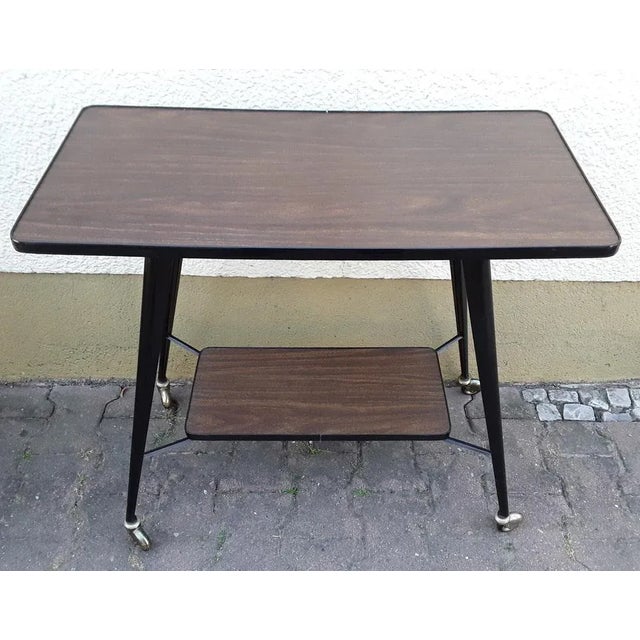 Vintage Side Table on Casters with Black Lacquered Metal Frame, Top & Shelf in Formica Coated Chipboard, 1960s, in Good...