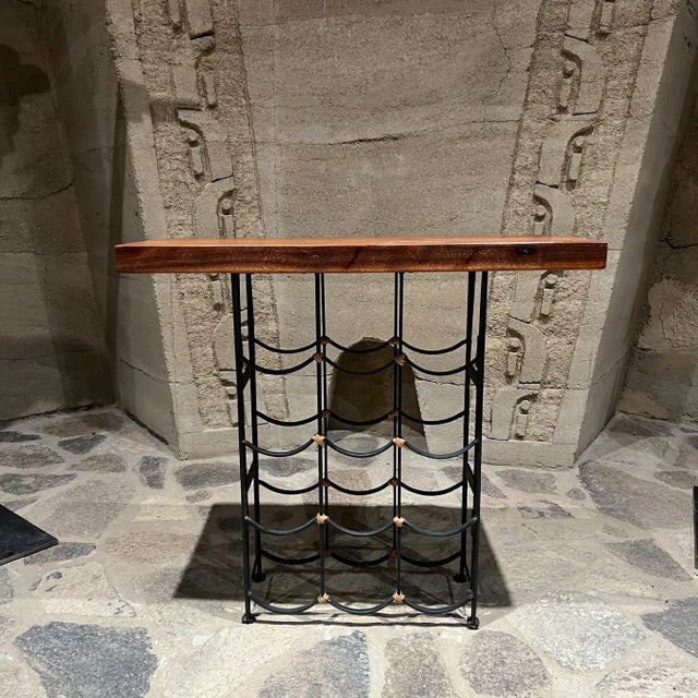 For your consideration, a 1950s mid-century modern wine bar table. It is an unmarked piece attributed to the well-known...