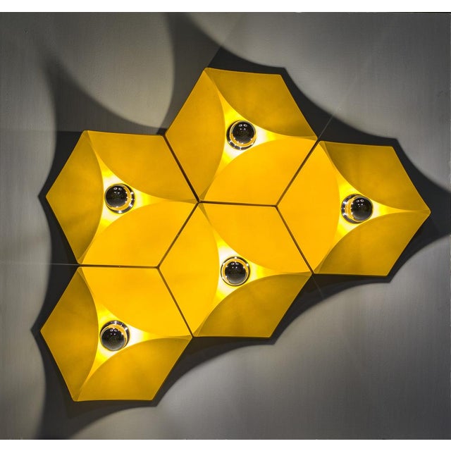 Stylish retro wall lamp from the 1970s, designed by the renowned German brand Hoffmeister-Leuchten. Unique hexagonal shape...