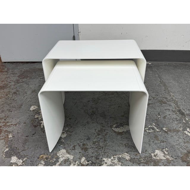 Design Plus Gallery presents the Nesting Tables from Scandinavian Designs. This two-table set has a contemporary waterfall...