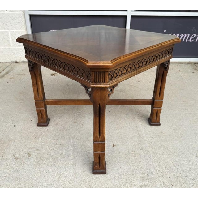 This Lane mahogany and walnut side table, No. 1247, features a beautifully figured parquetry top with a diamond-pattern...