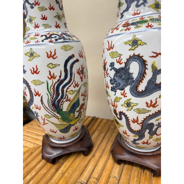 This is a rare pair of vintage Asian lamps. The history is unclear but they could have been urns at one time and converted...