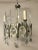This vintage Italian chandelier is made of crystal and chrome. It features three light sockets. This piece is designed in...