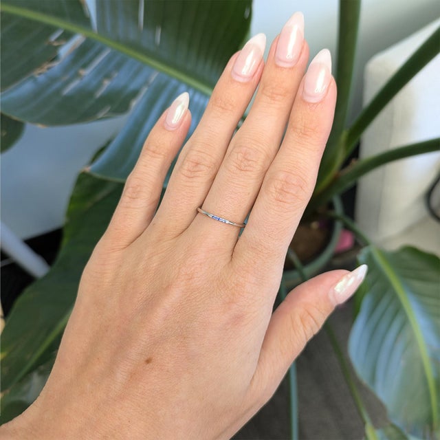 Elegant Blue Sapphire band ring crafted in solid 14K gold, designed for timeless sophistication and everyday elegance. A...