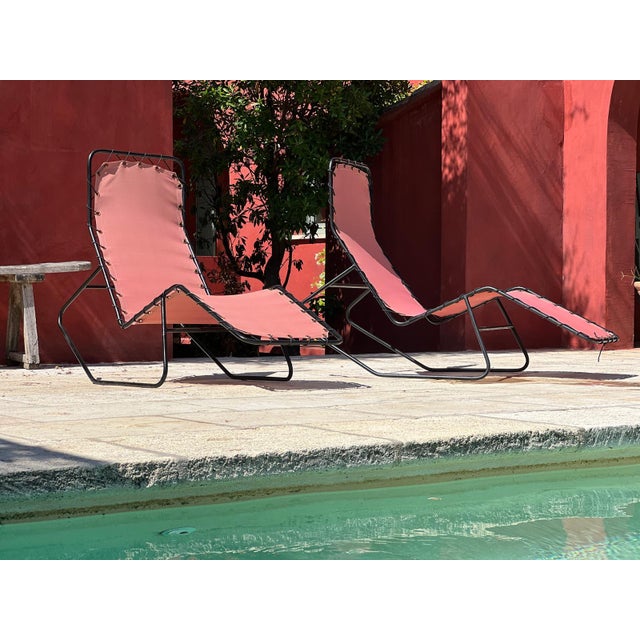 Set of four "Barwa" chaise longues by John Waldheim and Edgar Bartolucci, circa 1950, in black lacquered metal and brick-...