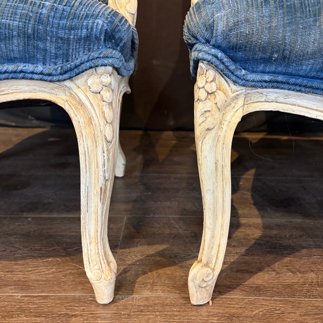Charming pair of 19th century French Louis XV armchairs, traditionally referred to as King and Queen chairs for their...