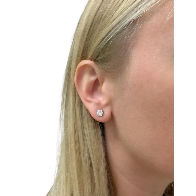 Elevate your collection with these Tiffany & Co. Round Brilliant Diamond Stud Earrings, showcasing 1.42 carats total of...