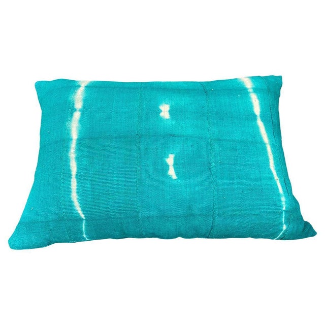 Green over-dyed mud cloth Mali textile from West Africa, made into a pillow. Double backed with concealed zipper. Insert...