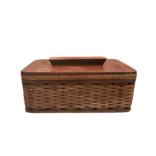 A gorgeous, handmade leather & parquet box. Features a woven leather design with leather adorning the sides, top, and...