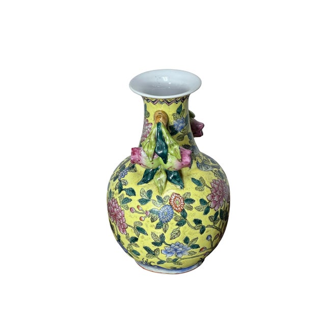 This is a beautiful Andrea by Sadek decorative porcelain vase. It's crafted in China and features a yellow "famille-jaune"...