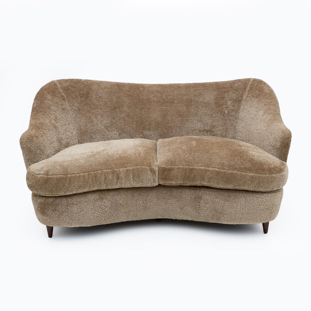 Mid-century two-seater sofa, collectible, attributed to Gio Ponti for the Casa e Giardino factory in the late 1930s. The...