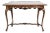 18th century Italian console table in walnut wood. The Italian console has four curved legs connected by a stretcher with...