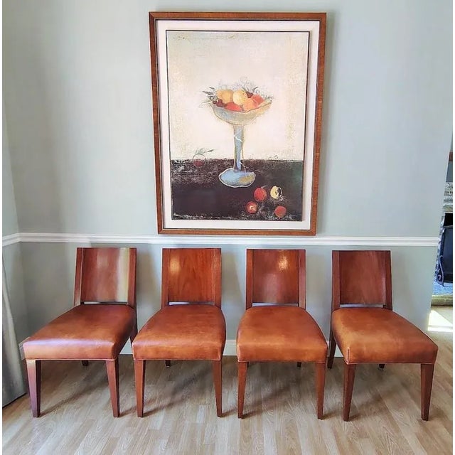 These gorgeous Ralph Lauren dining chairs are stunning with beautiful mahogany back and soft high end leather. They are...