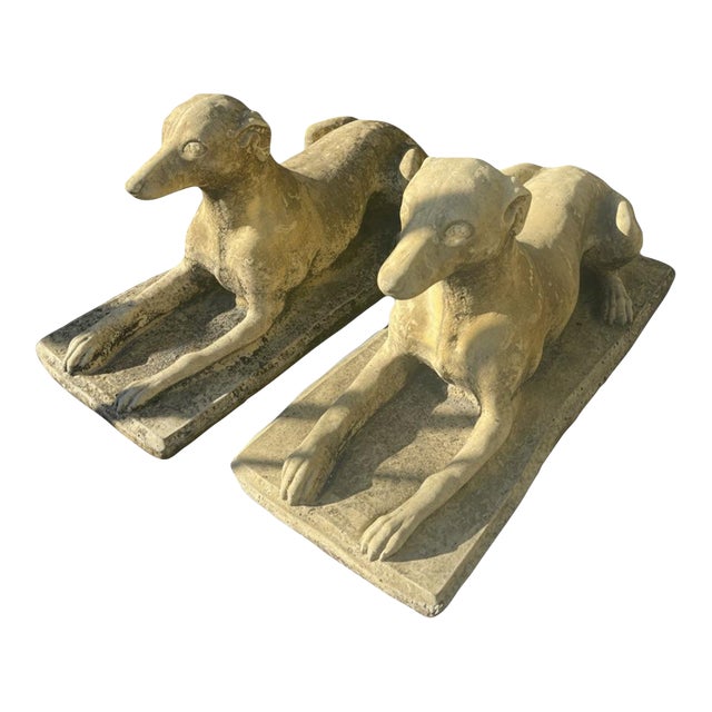 Vintage Weathered Reconstituted Stone Greyhound Statues - A Pair For Sale